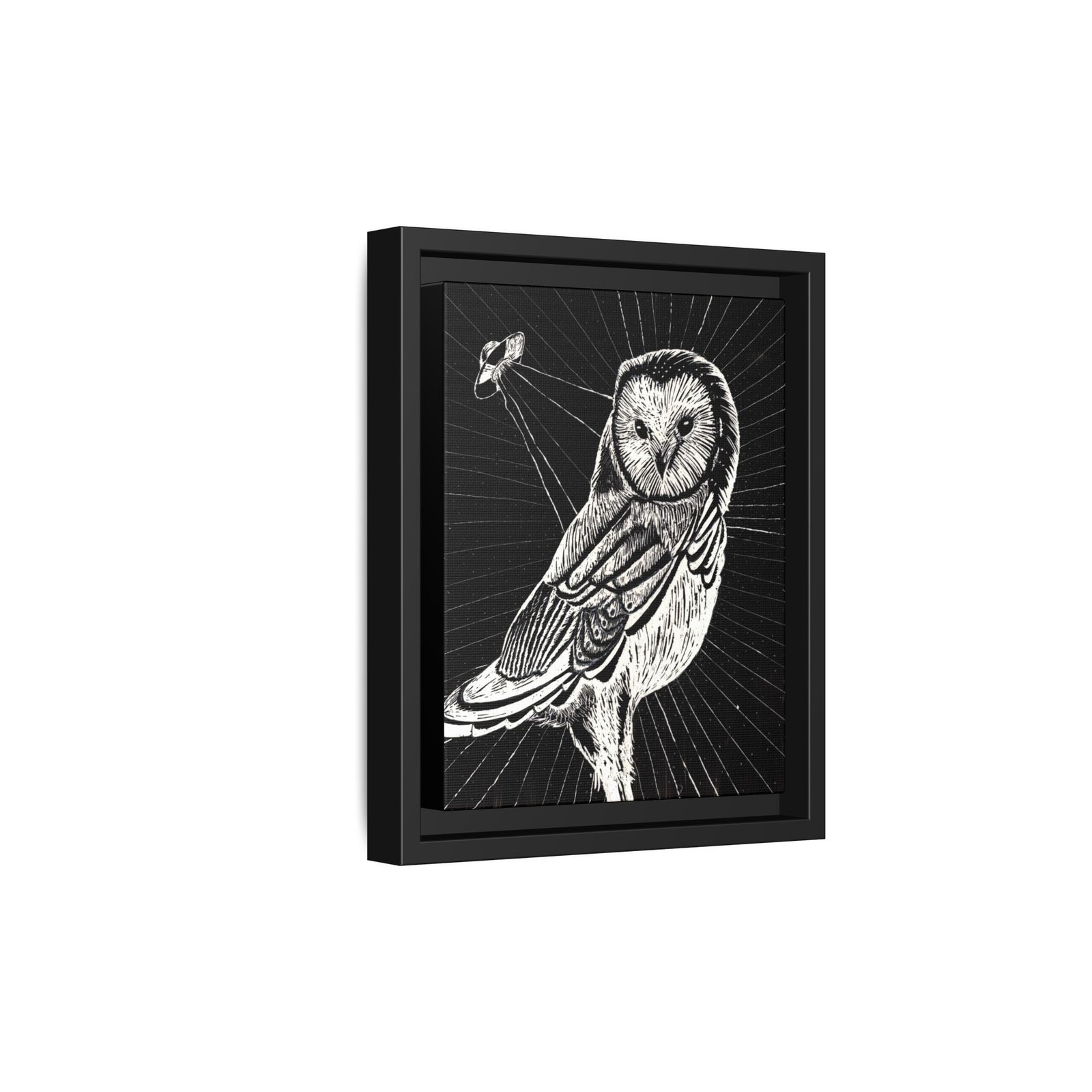 Framed monochrome UFO space owl canvas print with black frame 8 by 10 inches skewed